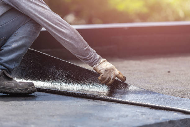 Professional Emergency Waterproofing technician working in Scottville, MI